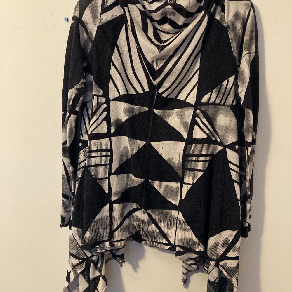 Billabong black and cream sweater with geometric prints. Size M.